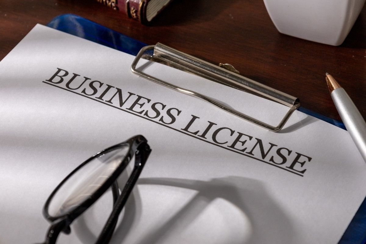 Business license paperwork representing tree service licensing and company credentials in Florida.